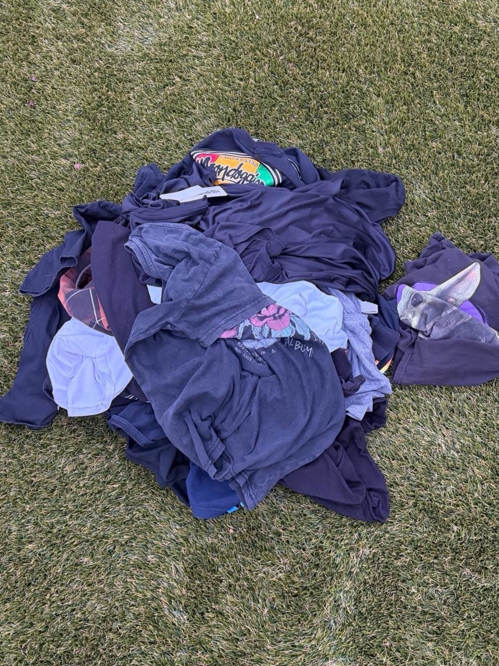 Bundle of 19 shirts. A mix of new tags and used.